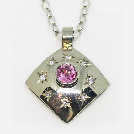 18ct white gold, pink sapphire and star set white diamond pendant (Chain sold separately)