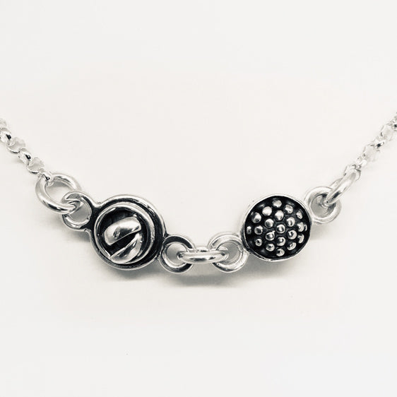 Sterling silver raspberry knot necklace