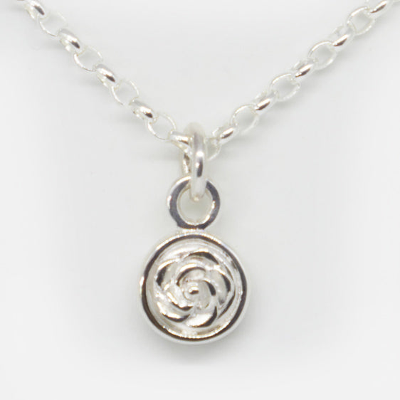 Sterling silver double sided rose pendant (chain sold separately)