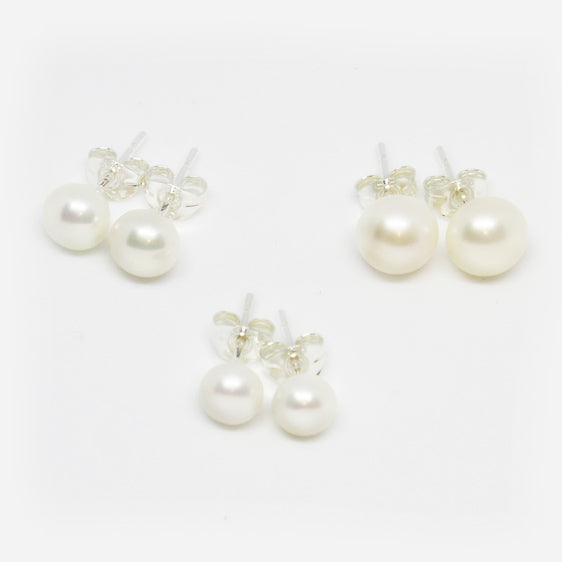 Fresh water pearl studs on Sterling Silver backs with butterflies